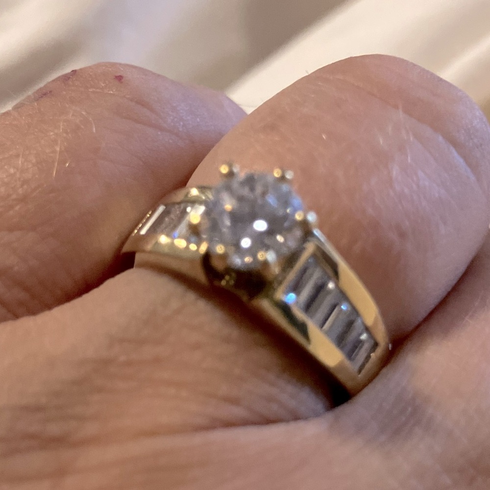 Stunning solitaire ring set in gold with triple A quality cubic zirconia